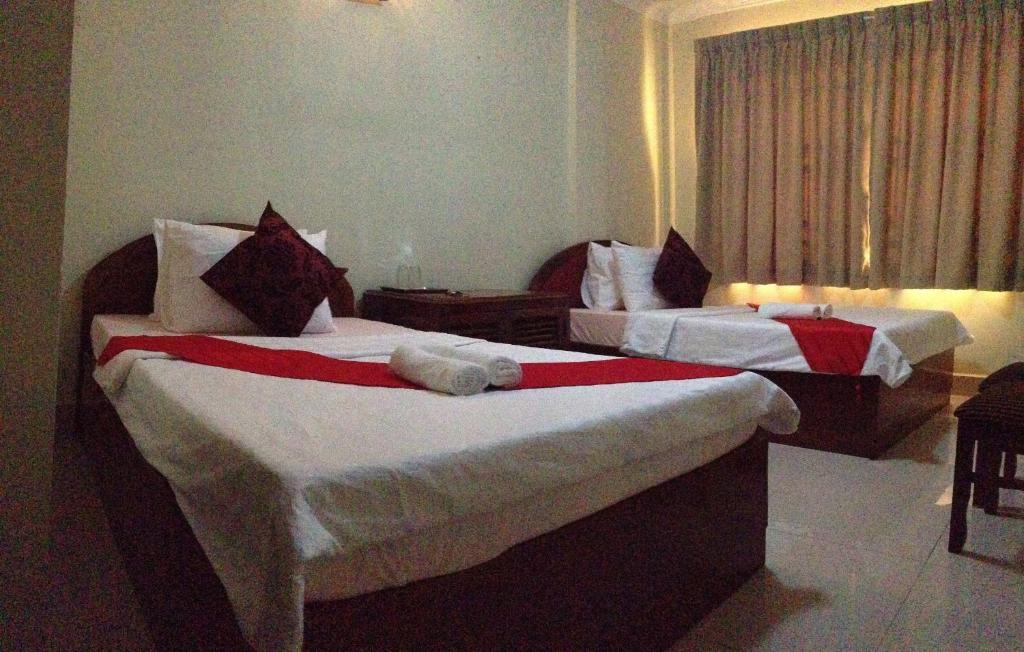 Homeland Guesthouse Phnom Penh Bilik gambar